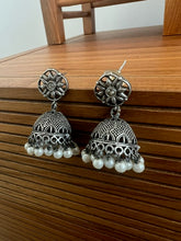 Intricate silver pearl drop earrings